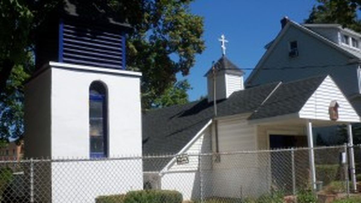Bell tower and existing Saint George Church building